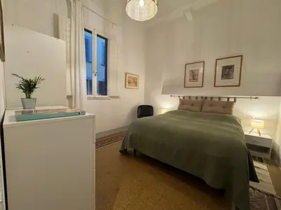 Letto o letti in una camera di Ambrogio 33 - three bedrooms three bathrooms
