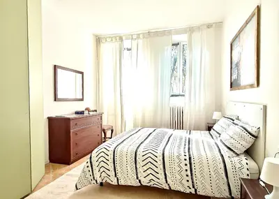 Letto o letti in una camera di Casa Stibbert Garden Retreat