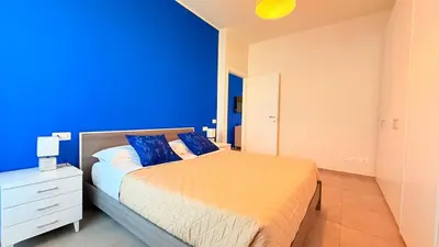 Letto o letti in una camera di Appartamento Dante