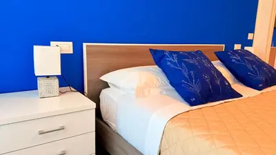 Letto o letti in una camera di Appartamento Dante