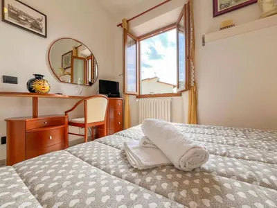 Letto o letti in una camera di La Botte - Original Tuscany Duplex