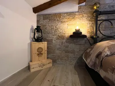 Letto o letti in una camera di La Botte - Original Tuscany Duplex