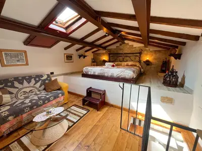 Letto o letti in una camera di La Botte - Original Tuscany Duplex