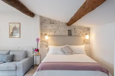 Letto o letti in una camera di Design Loft Belle Donne