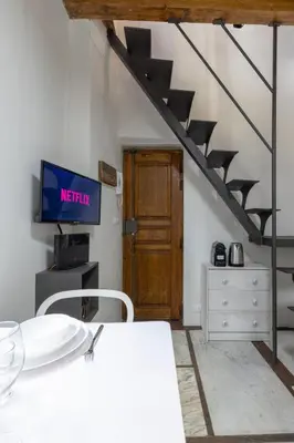 TV o dispositivi per l'intrattenimento presso Uffizi-Ponte Vecchio Mini Loft con affreschi
