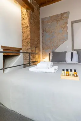 Letto o letti in una camera di Uffizi-Ponte Vecchio Mini Loft con affreschi