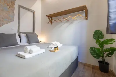 Letto o letti in una camera di Uffizi-Ponte Vecchio Mini Loft con affreschi