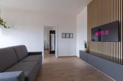 TV o dispositivi per l'intrattenimento presso Amazing Apt Free Private Parking 18 min by train to Florence