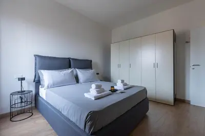 Letto o letti in una camera di Amazing Apt Free Private Parking 18 min by train to Florence