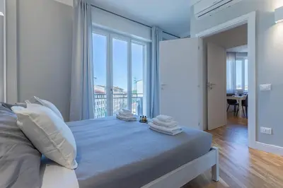 Letto o letti in una camera di Careggi-Rifredi CHIC Apartment Tramvia-Parking