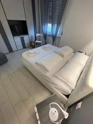 Letto o letti in una camera di APPARTAMENTO BLU - Relax and Comfort 20 minutes from Florence