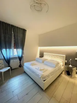 Letto o letti in una camera di APPARTAMENTO BLU - Relax and Comfort 20 minutes from Florence
