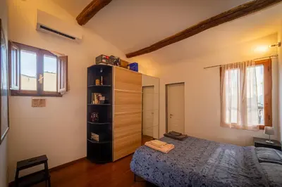 Letto o letti in una camera di Stairway to Florence