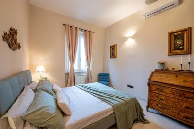 Letto o letti in una camera di Appartamento vicino al centro