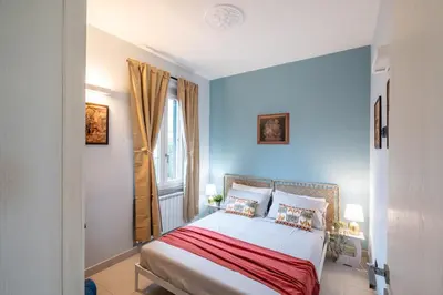 Letto o letti in una camera di Appartamento vicino al centro