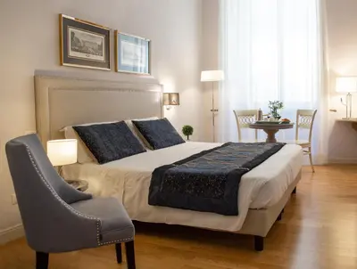 Letto o letti in una camera di Boutique Hotel del Corso