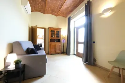 Area soggiorno di Wine Apartments Florence Barbaresco