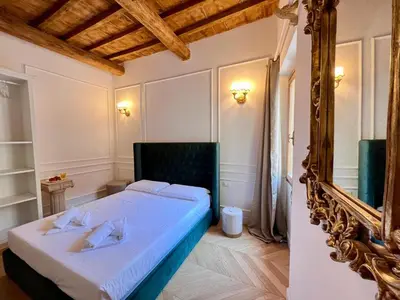 Letto o letti in una camera di Petit Paris Fiorentina