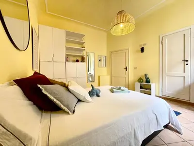 Letto o letti in una camera di HealthyHome Caracciolo Essential