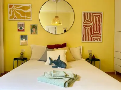 Letto o letti in una camera di HealthyHome Caracciolo Essential