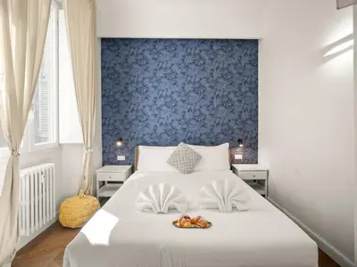 Letto o letti in una camera di Four Season's Ghibellina Luxury Apartment 300 mt from Duomo