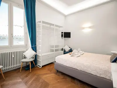 Letto o letti in una camera di Four Season's Ghibellina Luxury Apartment 300 mt from Duomo