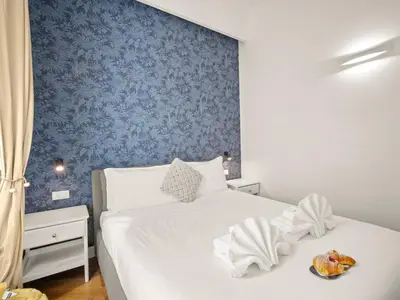 Letto o letti in una camera di Four Season's Ghibellina Luxury Apartment 300 mt from Duomo