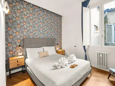 Letto o letti in una camera di Four Season's Ghibellina Luxury Apartment 300 mt from Duomo