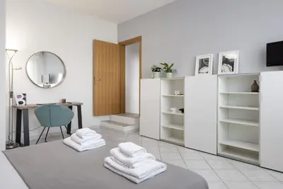 Letto o letti in una camera di Manifattura Tabacchi Holiday Home