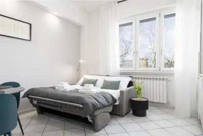 Letto o letti in una camera di Manifattura Tabacchi Holiday Home