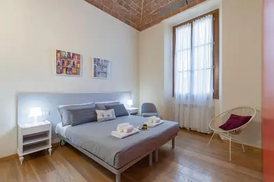 Letto o letti in una camera di Residenza Storica 18 min Di Treno Per Firenze