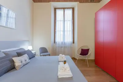 Letto o letti in una camera di Residenza Storica 18 min Di Treno Per Firenze
