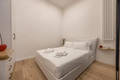 Letto o letti in una camera di Boboli Dreams- Luxury in the Historic Heart of Florence