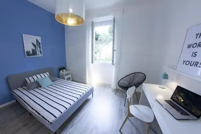 Letto o letti in una camera di UNYCA - Florence Modern 3-bedroom Apartment