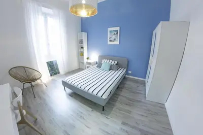Letto o letti in una camera di UNYCA - Florence Modern 3-bedroom Apartment
