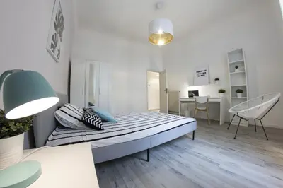 Letto o letti in una camera di UNYCA - Florence Modern 3-bedroom Apartment
