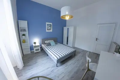 Letto o letti in una camera di UNYCA - Florence Modern 3-bedroom Apartment