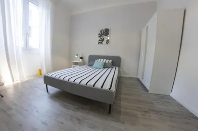 Letto o letti in una camera di UNYCA - Florence Modern 3-bedroom Apartment