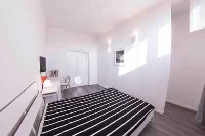 Letto o letti in una camera di UNYCA - 4 bedroom Apartment in Florence