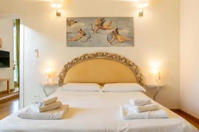 Letto o letti in una camera di Sant'Ambrogio Apartments - Donatello