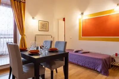 Letto o letti in una camera di Sant'Ambrogio Apartments - Raffaello
