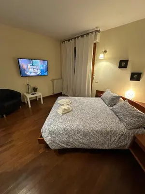 Letto o letti in una camera di Relais Madama Dorè