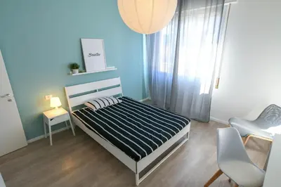 Letto o letti in una camera di UNYCA - 4 bedroom Apartment in Florence 2