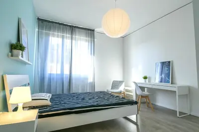 TV o dispositivi per l'intrattenimento presso UNYCA - 4 bedroom Apartment in Florence 2