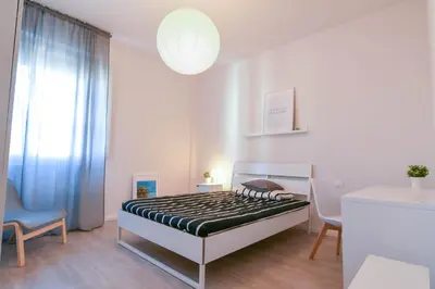 Letto o letti in una camera di UNYCA - 4 bedroom Apartment in Florence 2