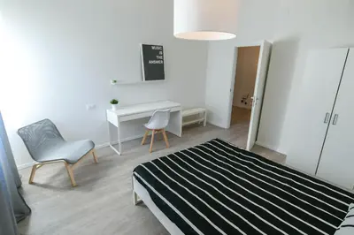 Letto o letti in una camera di UNYCA - 4 bedroom Apartment in Florence 2