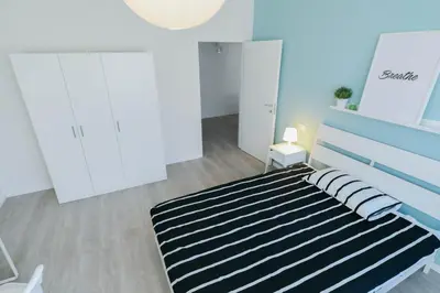 Letto o letti in una camera di UNYCA - 4 bedroom Apartment in Florence 2
