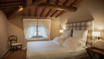 Letto o letti in una camera di Dimora Ghirlandaio