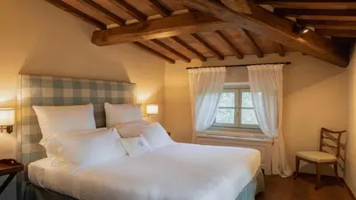 Letto o letti in una camera di Dimora Ghirlandaio