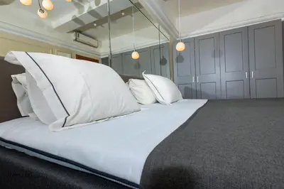 Letto o letti in una camera di Adam And Eve Florence